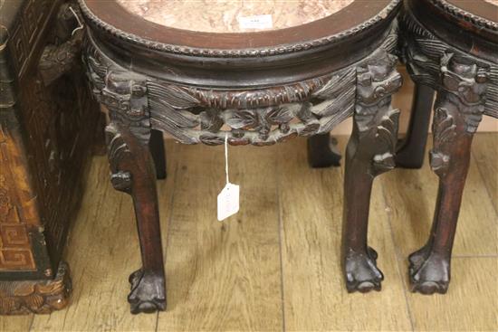 A pair of Chinese hardwood and marble stands H.47cm